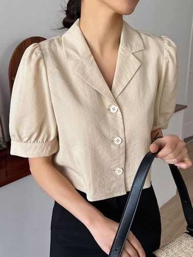 Blusa beige lino solapa botones