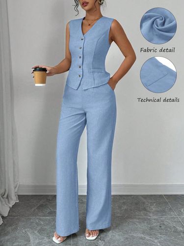 Conjunto chaleco y pantalón azul