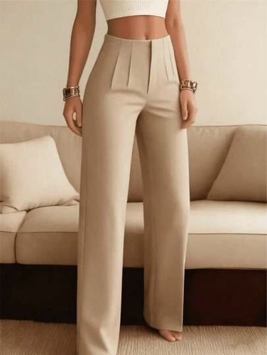 Pantalón beige pierna ancha pinzas